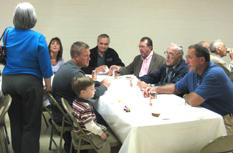 Many of the mission's 55 registered members gather in the parish hall for an informal reception to catch up after Mass.
