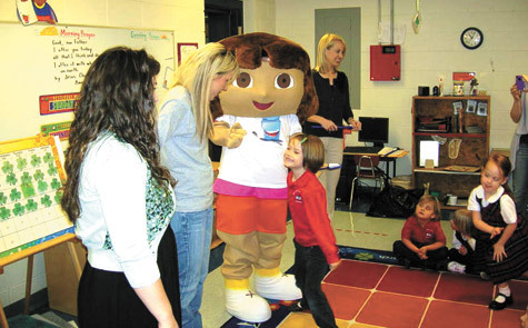 "Dora the Explorer," a popular animated character, visited the pre-k class at St. John School in Russellville March 28. Dora taught the children the proper way to brush their teeth. The visit was funded by the Junior Auxiliary of Russellville.