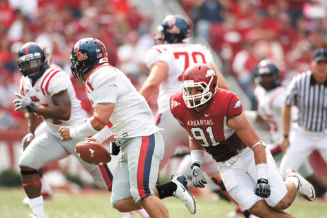 Jake Bequette, No. 91 on the Arkansas Razorbacks, goes on the defensive during the Oct. 23, 2010, game against Ole Miss at Donald W. Reynolds Razorback Stadium in Fayetteville. The Razorbacks won 38-24.