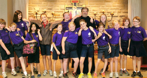 The fifth-grade girls from St. Joseph Elementary School in Conway meet with Father Elijah Owens, OSB, during a trip to Subiaco Abbey. Father Owens and the girls have been praying for each other throughout the school year. Fifth graders from St. Joseph School were led on a visit to Subiaco by their teacher Lindsey Thompson and associate pastor Father James Melnick. Joining them to speak about vocations were Olivetan Benedictine sisters from Holy Angels Convent in Jonesboro and Benedictine monks at Subiaco Abbey.