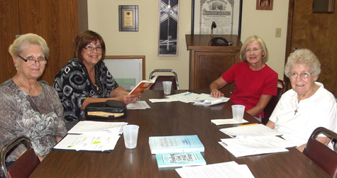 Celeste Williams, director of religious education Sharon Goodson, Betty Masingale and Kitty Raley gather at St. Mary Church in Paragould Sept. 27 to participate in the video-based Ignatian discernment program called "Is That You God?"