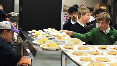 Catholic High School students descend on the school's newly-renovated cafeteria during a recent lunchtime. The school's meal program is catered by J&F Food Service and includes plate lunches and <em>ala carte</em> items.