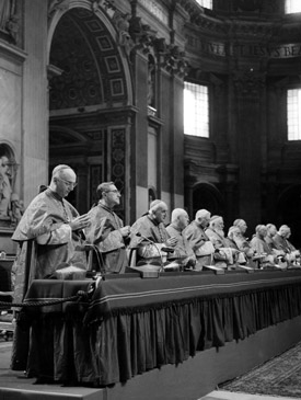 The presidents of the Second Vatican Council are pictured during a council meeting inside St. Peter's Basilica in this undated file photo. The 50th anniversary of Vatican II is an opportunity to revisit the teaching of its documents.