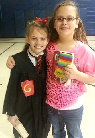 Franny Edwards and Mary Helen Owen of North Little Rock Catholic Academy dress as their favorite book characters at the book character costume con-test for Catholic Schools Week in January 2013.