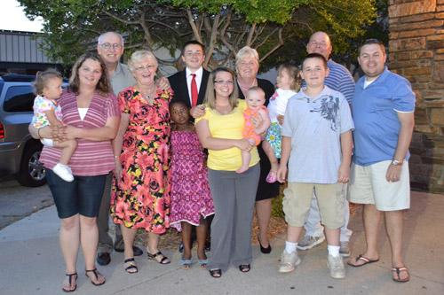 The Peterson family gathers in 2012 at Christ the King Church in Fort Smith for confirmation for older son, Drew (back row, second from left). Joining Annie Peterson, holding granddaughter Millie Jackson and Brett Peterson (back row, right) are daughter Jennifer Jackson (front row) holding her daughter Sophia; grandmother Polly Prusch; daughter Kalis Peterson; daughter Christine Howell holding her daughter Afton; son Danny Peterson, grandfather Jack Prusch (back row, left) and son-in-law Kevin Howell (front row, right).