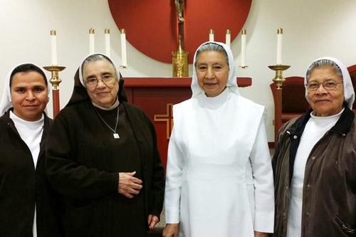 Sisters Maria Lozano, Carmen Olivas, Cecilia Toledo and Adela Lopez, CMST, serve the growing community at Holy Spirit Church in Hamburg with home visits and sacramental preparation.