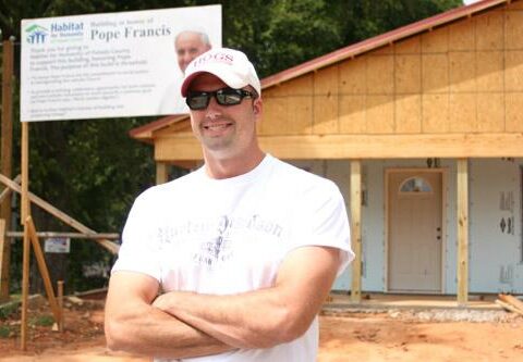 Luke Stovall, 30, founder of the Catholic Young Professionals Service Organization, has helped work on the Pope Francis House, a project by Habitat for Humanity of Pulaski County with help from Catholic Charities of Arkansas.