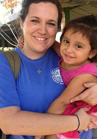 Jennifer Verkamp bonds with Julissa in March 2014 at the Franciscan orphanage in Esquipulas, Guatemala.