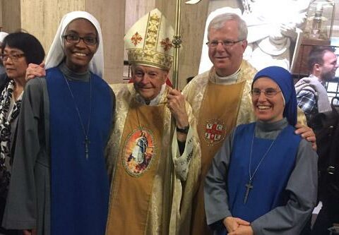 Sister Kibeho, (left) a 22-year-old from Christ the King Church in Little Rock, is a novice with the Servants of the Lord & Virgin of Matara in Maryland. On Dec. 7, she received her habit during an investiture ceremony in Washington, D.C. Also pictured from left: Cardinal Theodore McCarrick, archbishop emeritus of Washington, D.C.; Msgr. Francis Malone, pastor of Christ the King Church; and Mother Mary of the Sacred Heart Gaes, provincial superior.