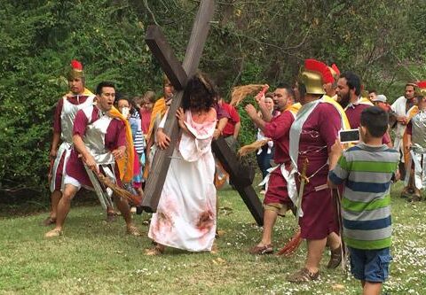Jesus, played by Leonel Ramirez, carries his cross on Good Friday 2015 in live Stations of the Cross at Our Lady of Fatima Church in Benton. Playing Roman guards are David Linares (left), Juan Luis Ramirez, Efrain Huerta, Efrain Mendoza and Ilarion Atilano.