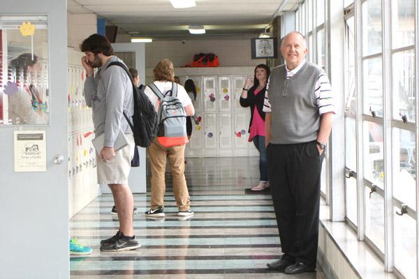 St. Joseph High School Principal Joe Mallett often greets students in the hallways between classes. Mallett, who has spent the past 36 years at the school, will resign after this school year.