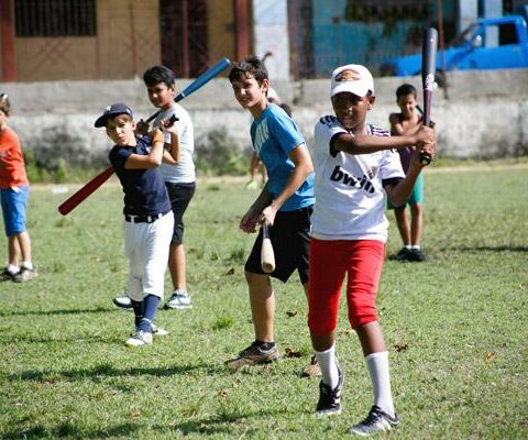 Boys warm up during the Holy Childhood Association baseball encounter in Cuba in late May. The camp was hosted by a team of professional baseball coaches and Catholic leaders from the Pontifical Mission Societies.