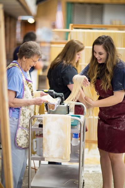 Italian traditions are still alive and thriving in Tontitown as Jettie Franco passes on her skill in the art of spaghetti-making to 16-year-old Shelby Pianalto. Pianalto was Queen Concordia for the 2016 Tontitown Grape Festival.