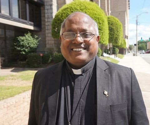 Father Irudayaraj Chinnaiah Yeddanapalli poses outside the Cathedral of St. Andrew in Little Rock before the Jubilarian Mass June 27. Father Y.C., pastor of St. John Church in Hot Springs, has served 25 years as a priest.