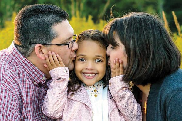 Olivia, 5, was adopted as a baby by Michael and Rebecca through Catholic Adoption Services in Little Rock. Families thinking about interracial adoption are encouraged to research what it means to be a multi-cultural family.