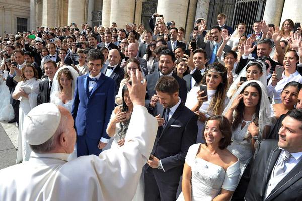 Pope Francis greets newly married couples during his general audience in St. Peter&#039;s Square at the Vatican in this Sept. 30, 2015, file photo. In 2016 the pope released a major document, &quot;Amoris Laetitia,&quot; which focused on love in the family. (CNS photo/L&#039;Osservatore Romano)