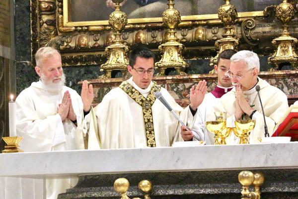 Msgr. Scott Friend (left), diocesan vocations director, and Bishop Anthony B. Taylor traveled to Rome to celebrate the ordination Mass for Father Martin Amaro (center) in the Choir Chapel of St. Peter Basilica May 11.