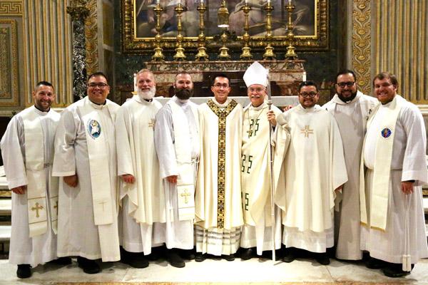 Father Amaro poses with Bishop Taylor and fellow Diocese of Little Rock priests who made the trip to Rome for his May 11 ordination. They are Father Stephen Gadberry (left), Father Juan Guido, vocations director Msgr. Scott Friend, Father Jeff Hebert, Father Juan Manjarrez, vocations spiritual formation advisor Father Rub&eacute;n Quinteros and Father Martin Siebold. (Denis Nakkeeran photo, Pontifical North American College)