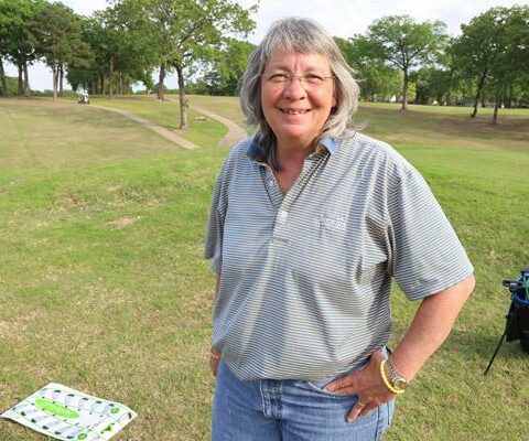 Dawn Darter takes a break from golf lessons at The Greens at North Hills in Sherwood. The Arkansas Golf Hall of Famer grew up on the golf course, right next door to Immaculate Conception Church.