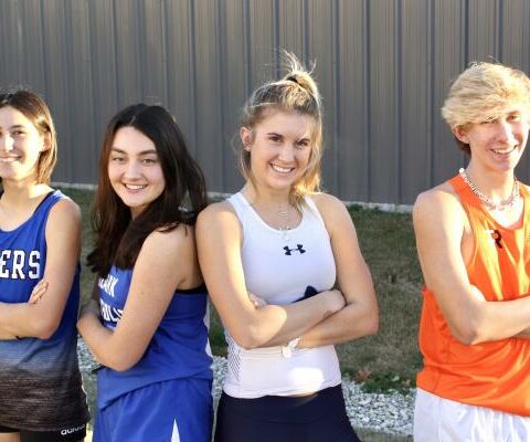 Northwest Arkansas high school runners Mia Loafman (from left), Mary Helen Schaefer, Abigail Livingston and Dawson Welch say training and hard work helped them cope during the pandemic and have a successful cross country season. Jacob Tyburski is not pictured.