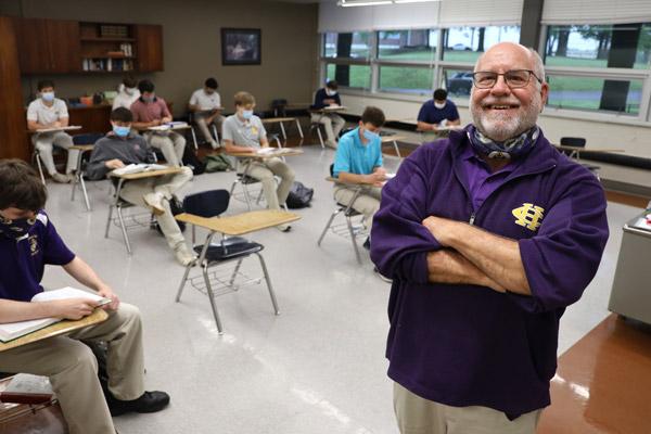 Steve Wells kicks off another lesson in literature for a homeroom full of Catholic High seniors April 14. The CHS alum and North Little Rock native is retiring at the end of the term after nearly 40 years in the classroom.