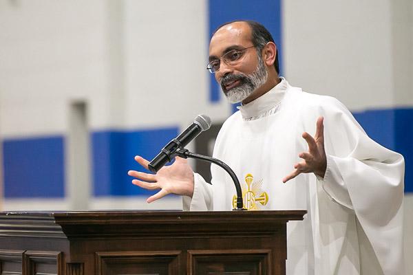Father John Antony, who celebrated his 25th anniversary as a priest on Pentecost May 23, gives a homily during the eighth-grade Trinity Junior High School graduation May 18 in Fort Smith.