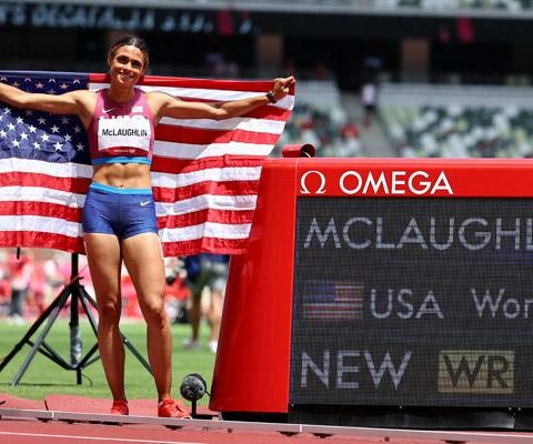 U.S. runner and gold medalist Sydney McLaughlin celebrates Aug. 4, 2021, after breaking the world record to win the women' 400-meter hurdles final at Olympic Stadium at the 2020 Tokyo Olympics.