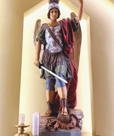 A statue of St. Michael the Archangel stands in the sanctuary of St. Michael Church in Van Buren. In recent years, the parish has prayed a 40-day devotion to their patron saint.