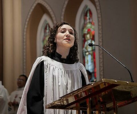 Rosemarie Ochoa sings during the priesthood ordination of Fathers Daniel Wendel and Jaime Nieto at the Cathedral of St. Andrew in Little Rock, May 28.
