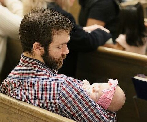 Will Betzner, with four-month-old Ida Jane betzner, and his wife, Sarah, started going to Mass weekly at Christ the King Church in Little Rock when they found out they were going to be parents and have not missed a Sunday Mass since.