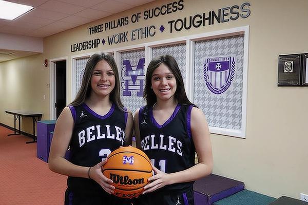 Senior Alexia Coca (left) and little sister, freshman Ava Coca, have the rare chance to play varsity basketball this season, plus are preparing to play together again for the upcoming soccer season.