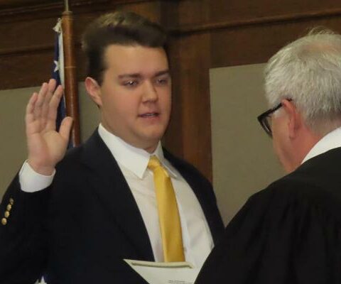 Dayton Myers, deputy grand knight for Knights of Columbus Council #6419 in Hot Springs, is sworn in Jan. 1 to the Garland County Quorum Court by Division 3 Circuit Court Judge Lynn Williams.