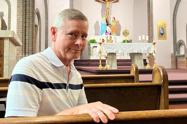 Don Kremer smiles inside the adoration chapel at St. Joseph Church in Conway May 26. Kremer, 69, is active in teaching adult theology classes and spiritual direction, and enjoys spending time with Jesus during his adoration hour.