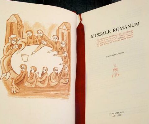 An illustration of the Last Supper appears opposite the title page of the third typical edition of Roman Missal in Latin in this file photo from 2002.