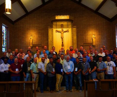 The current diaconate formation class, seen here Sept. 9, includes 60 men from around the diocese. They meet one weekend a month at St. John Center in Little Rock with their wives for classes.