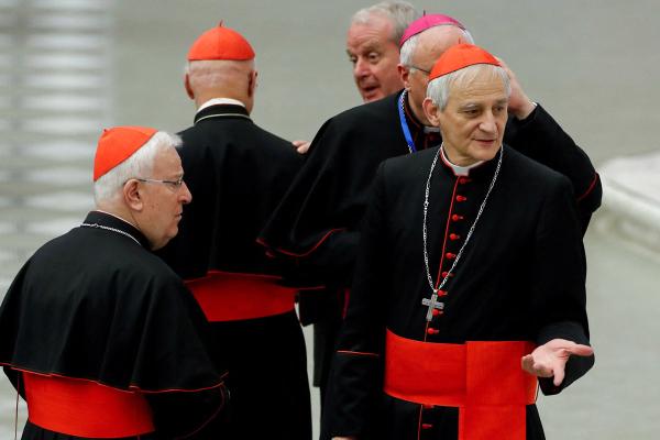 Cardinal Matteo Zuppi gestures after a meeting between Pope Francis and bishops and delegates of Italy's Synodal Path in Paul VI hall, at the Vatican, May 25, 2023.
