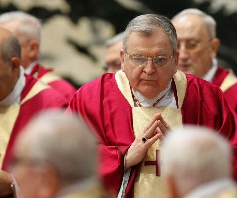 U.S. Cardinal Raymond L. Burke is pictured after receiving Communion during the funeral Mass for Australian Cardinal George Pell in St. Peter's Basilica at the Vatican in this file photo from Jan. 14, 2023.