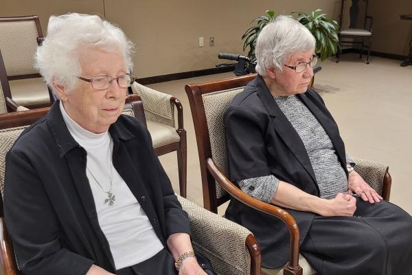 Sisters Maria DeAngeli (left) and Elise Forst, OSB, pray on the vigil of St. 
Scholastica Feb. 9 in the St. Scholastica Monastery chapel in Fort Smith.