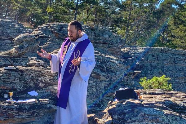 Father Ruben Quinteros, pastor of Immaculate Heart of Mary Church in North Little Rock (Marche) and St. Mary Church in North Little Rock, says Mass for a small group of priests during a hike on Pinnacle Mountain in Perryville August 2022. (Courtesy Father Ruben Quinteros)