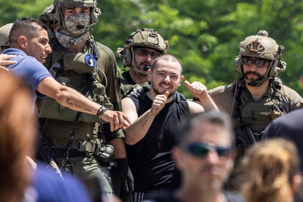 Almog Meir Jan, 22, a hostage rescued by Israeli forces June 8, reacts after being returned to Ramat Gan, Israel. The Israeli military rescued Jan and three other hostages from the central Gaza Strip in a heavy air and ground assault. (OSV News photo/Marko Djurica, Reuters)