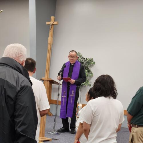 Knights of Columbus Council 996 Chaplain Father Joseph Chan leads Stations of the Cross at Columbus Hall in Fort Smith.